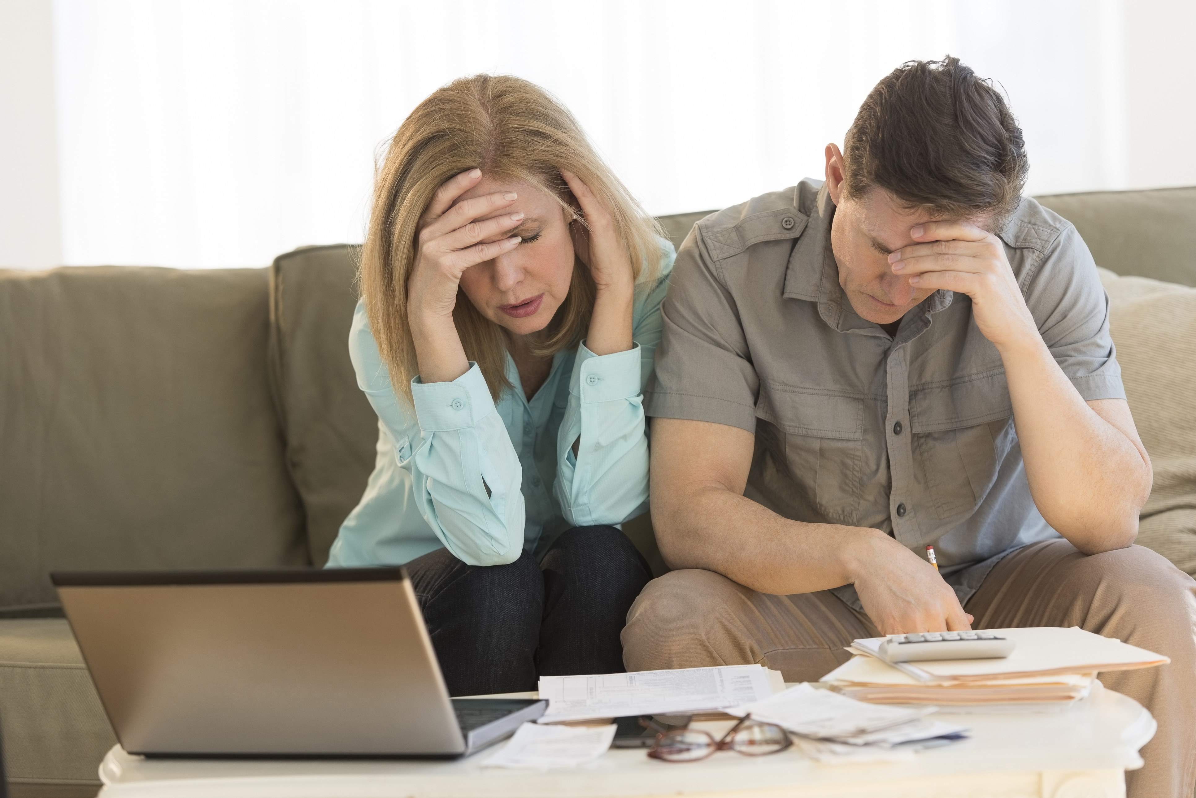 Concerned couple considering personal bankruptcy.